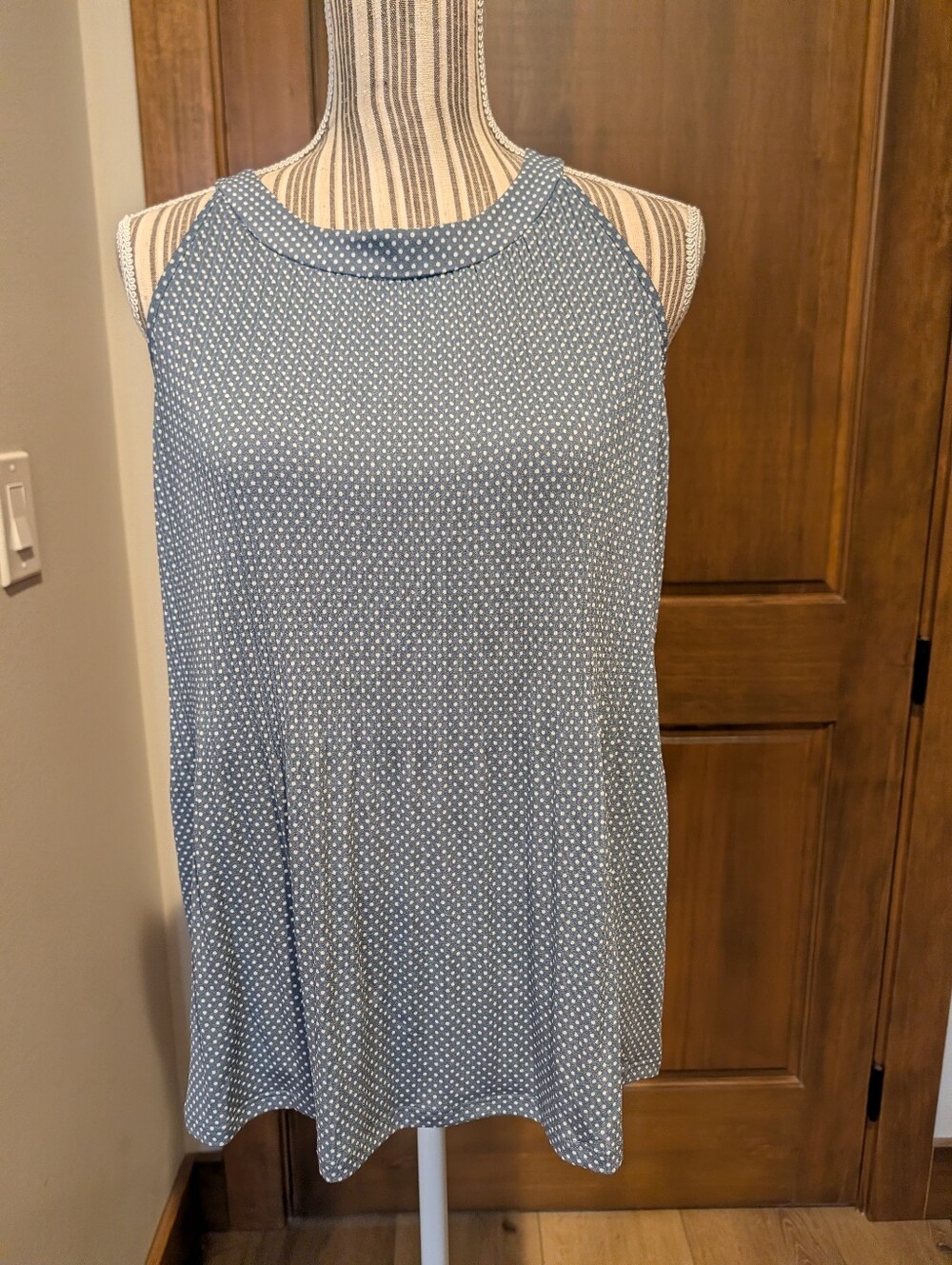 C & C California Women’s Sleeveless White Polka Dot Top On Blue-Gray Background